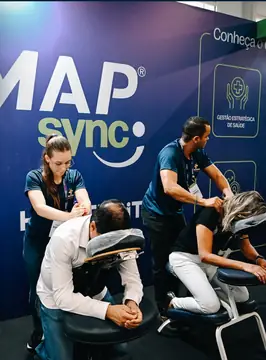 Quick massage no estande Romap Sync